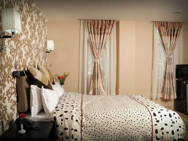 Nirvana Home : photo 3 de la chambre chambre lit king-size avec balcon