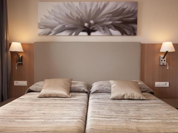 Hostal Centric : photo 7 de la chambre chambre lits jumeaux