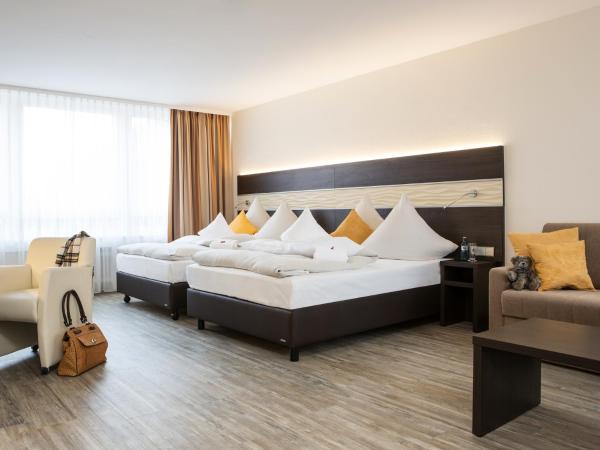 Concorde Hotel am Leineschloss : photo 5 de la chambre chambre lits jumeaux