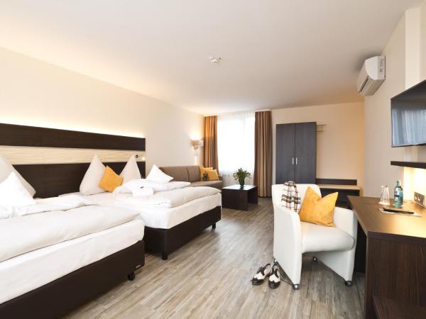 Concorde Hotel am Leineschloss : photo 2 de la chambre chambre lits jumeaux