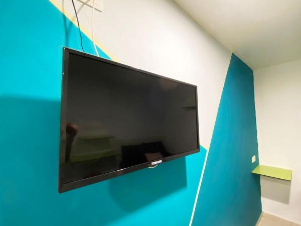 Hotel 91 Taman Daya : photo 4 de la chambre chambre double familiale