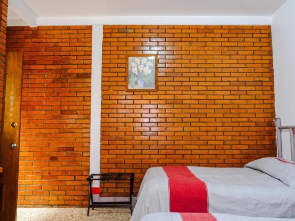 Hotel Posada el Cid : photo 2 de la chambre chambre triple