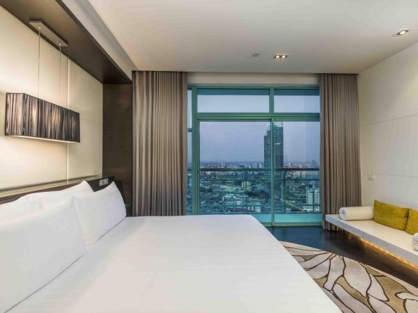 Hôtel Chatrium Riverside Bangkok : photo 4 de la chambre grande chambre lit king-size deluxe - vue sur ville 