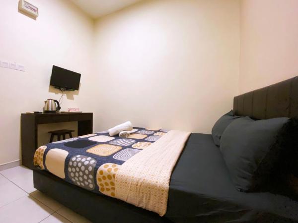 Ze Xiang Hotel - Desa Jaya Ikea Self Check in : photo 3 de la chambre chambre double Économique