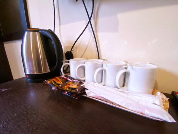 Ze Xiang Hotel - Desa Jaya Ikea Self Check in : photo 7 de la chambre chambre familiale