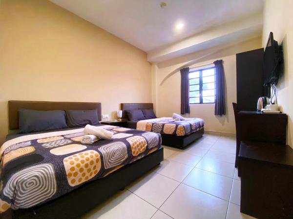 Ze Xiang Hotel - Desa Jaya Ikea Self Check in : photo 1 de la chambre chambre familiale