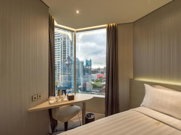 Ashley Wahid Hasyim Jakarta : photo 1 de la chambre chambre lits jumeaux deluxe