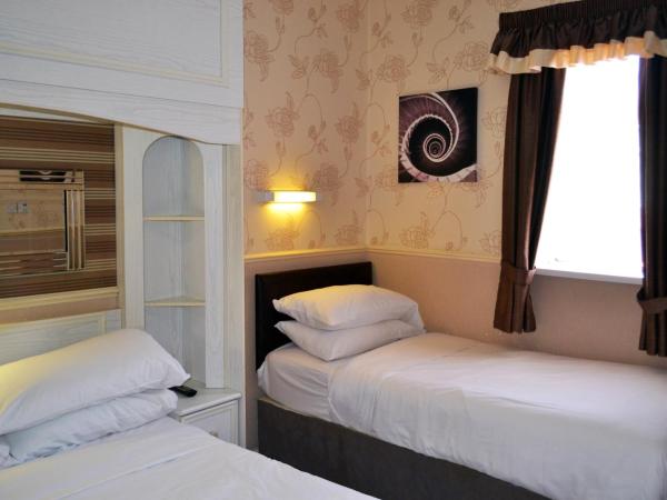Lyndene Hotel : photo 3 de la chambre chambre triple