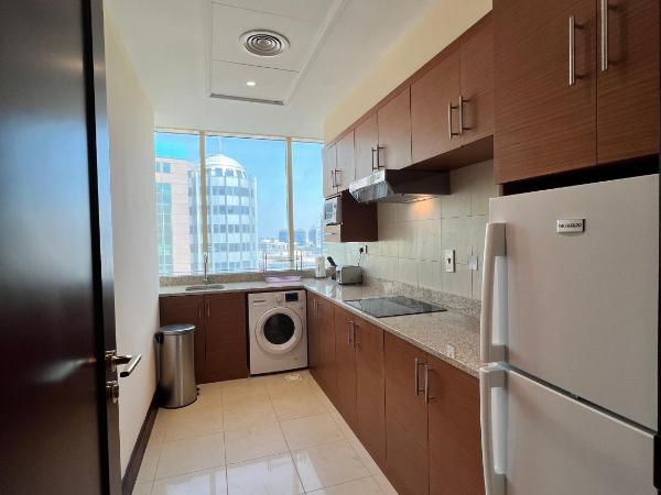 City Seasons Suites : photo 2 de la chambre suite de luxe