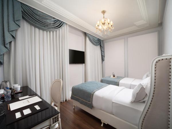 The Time Hotel Marina : photo 8 de la chambre chambre lits jumeaux classique avec vue sur la ville