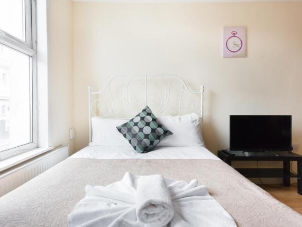 Comfortable Budget Apartment Next To Eurostar International - Kings Cross & Euston Station : photo 6 de la chambre chambre quadruple avec salle de bains privative