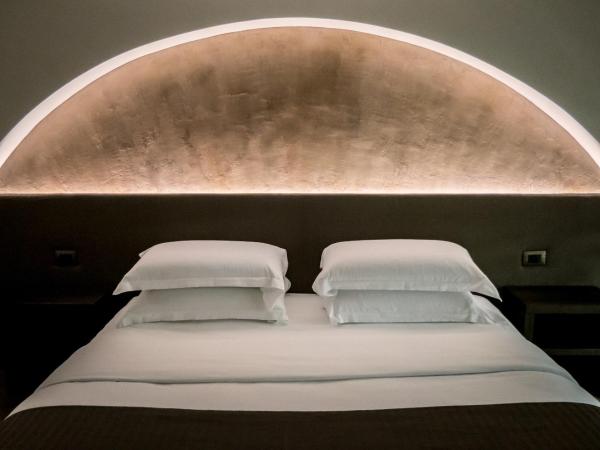 ARCADIAN suite&rooms : photo 1 de la chambre chambre supérieure lit queen-size