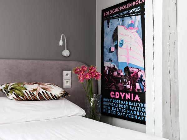 HOLA GDYNIA : photo 8 de la chambre chambre familiale