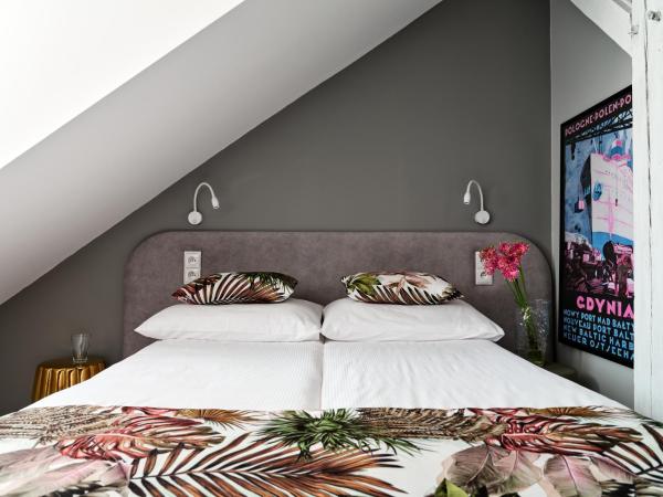 HOLA GDYNIA : photo 2 de la chambre chambre familiale