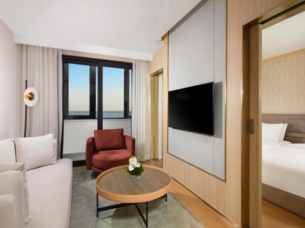 Eature Residences Lingang : photo 4 de la chambre deluxe studio king with living & dining room(northward)