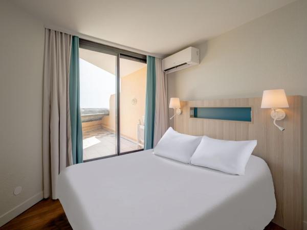 Résidence Pierre & Vacances Cannes Verrerie : photo 6 de la chambre appartement 1 chambre avec coin nuit dans alcôve, climatisation et terrasse ou balcon (6 personnes)