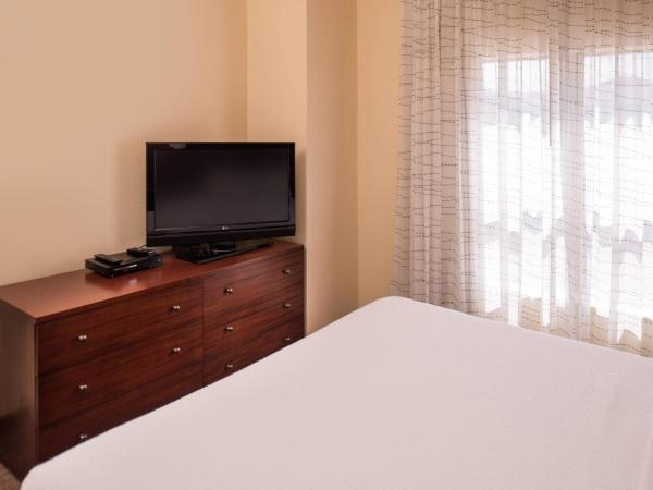 Residence Inn by Marriott Albuquerque Airport : photo 3 de la chambre suite lit king-size 1 chambre avec canapé-lit et cheminée