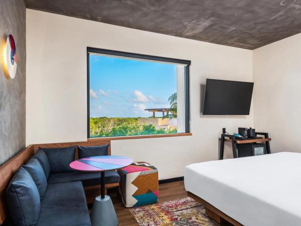 Aloft Tulum : photo 1 de la chambre chambre lit king-size - vue sur ville