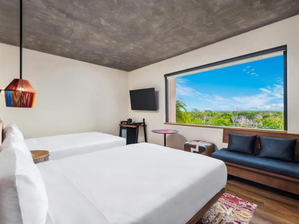 Aloft Tulum : photo 3 de la chambre chambre double avec 2 lits doubles - vue sur ville