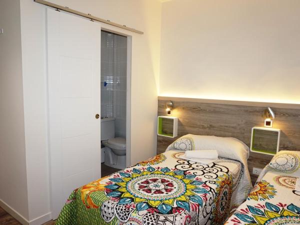 MuchoMadrid : photo 4 de la chambre chambre lits jumeaux avec salle de bains