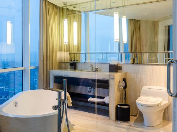 Hotel Ciputra World Surabaya managed by Swiss-Belhotel International : photo 6 de la chambre grande chambre double deluxe