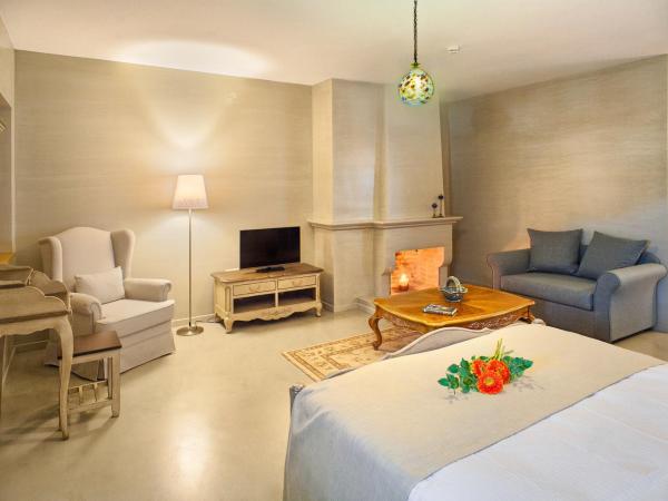 Haones Suites : photo 1 de la chambre suite junior avec balcon