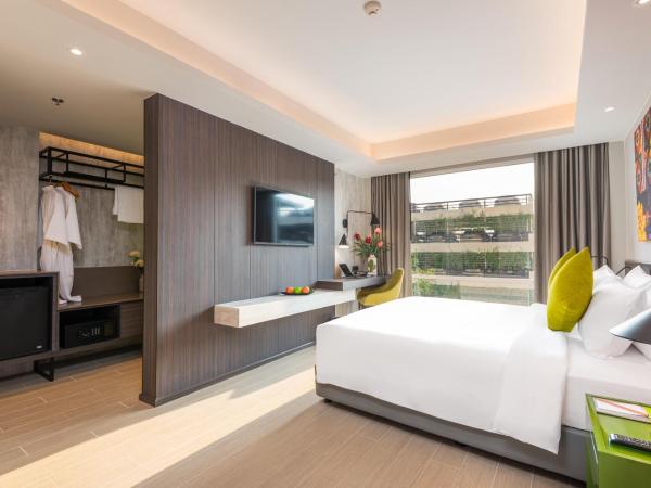 Maitria Hotel Rama 9 Bangkok - A Chatrium Collection : photo 10 de la chambre superior room garden view king room
