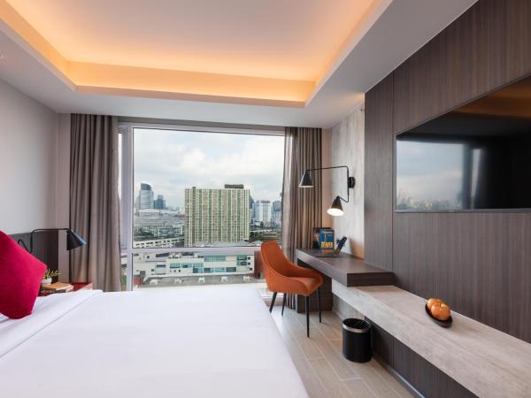 Maitria Hotel Rama 9 Bangkok - A Chatrium Collection : photo 4 de la chambre chambre lit king-size premier - vue sur ville