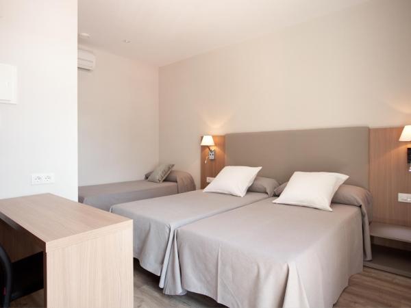 Hostal Centric : photo 6 de la chambre chambre triple