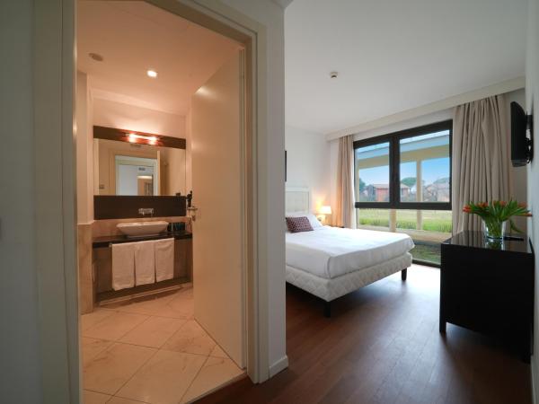 Pisa Tower Plaza : photo 1 de la chambre chambre familiale