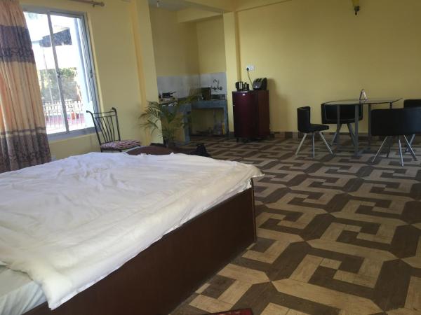 Hello Inn Guest House & Apartment : photo 2 de la chambre appartement avec balcon