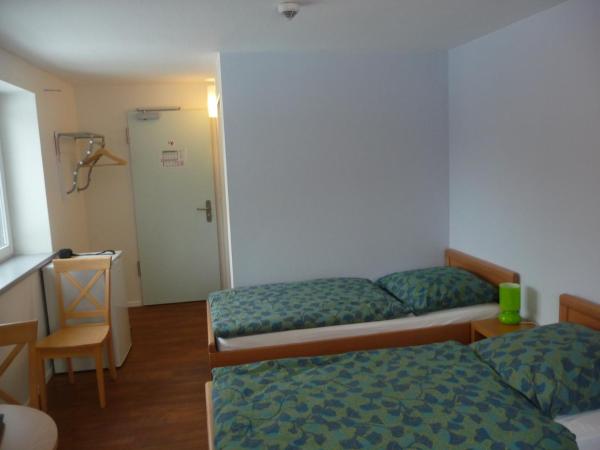 Hansehus : photo 6 de la chambre chambre lits jumeaux avec salle de bains