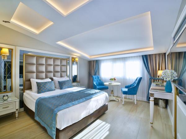 Büke Hotel Şişli : photo 6 de la chambre chambre familiale d'angle communicante