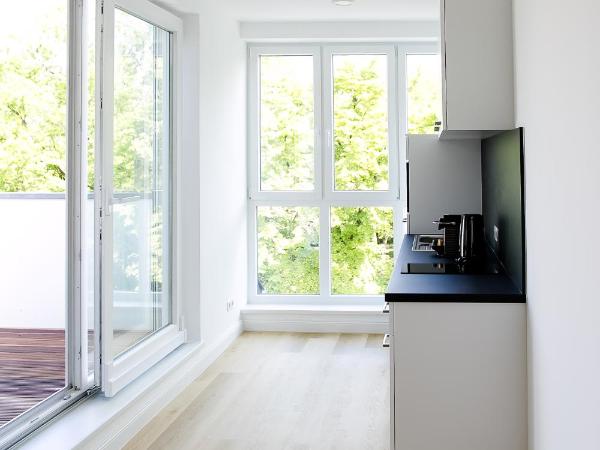 Louis & Louise Apartments & Lofts Am Wall I Digital Check In : photo 1 de la chambre appartement loft 1 chambre avec balcon