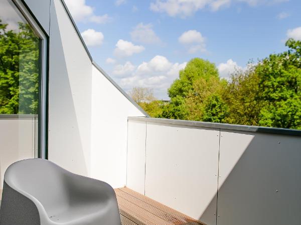 Louis & Louise Apartments & Lofts Am Wall I Digital Check In : photo 6 de la chambre appartement loft 1 chambre avec balcon