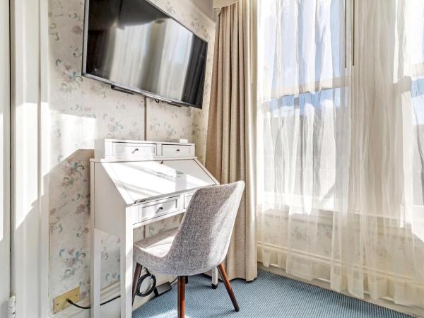 Cornell Hotel de France : photo 3 de la chambre chambre avec 2 lits doubles