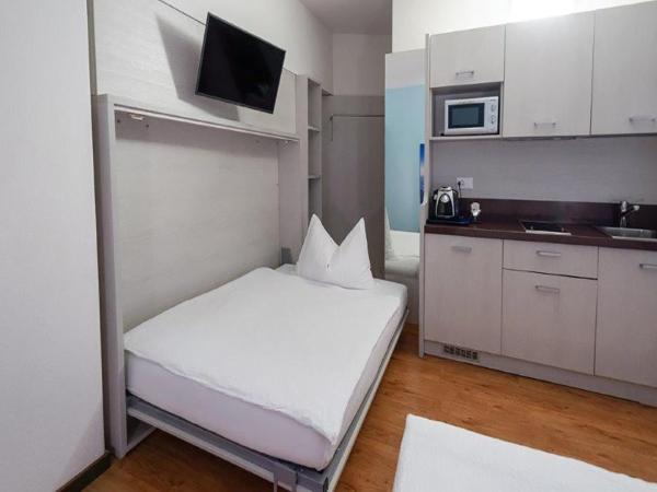 Acquarello Swiss Quality Hotel : photo 1 de la chambre studio avec kitchenette