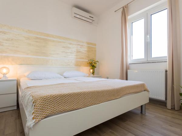 Apartments and Rooms Kod Keti : photo 5 de la chambre studio avec vue sur jardin