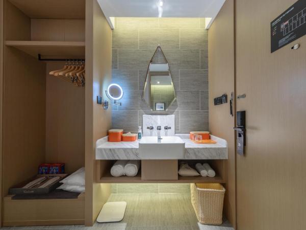 Atour Hotel Chongqing Jiangbei International Airport Huixing Light Rail Station : photo 1 de la chambre jimu suite