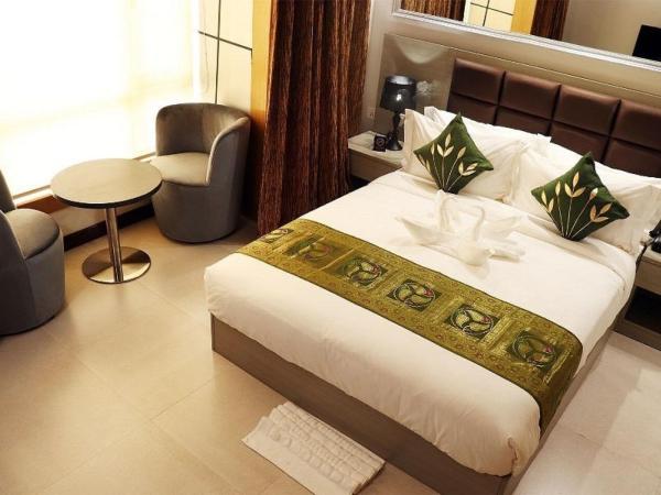 Aristocrat Hotel, New Town, Kolkata : photo 9 de la chambre chambre lit queen-size deluxe