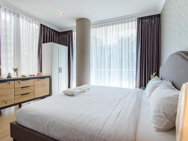 Family Room 3 Bedroom Free Water Park Condo Near Cicada and Tamarind Night Market ห้องแฟมมิลี่ 3 ห้องนอน ฟรีสวนน้ำ พัก 8 คน ใกล้ตลาดซิเคด้า มายรีสอร์ท : photo 2 de la chambre appartement