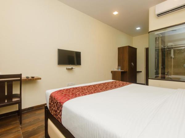Hotel Divine Residency Near Phoenix Marketcity : photo 1 de la chambre chambre triple deluxe
