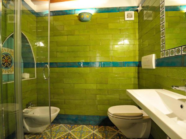 Albergo Del Centro Storico : photo 5 de la chambre chambre triple confort