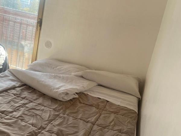 MRHostel Milano : photo 3 de la chambre chambre triple avec salle de bains commune