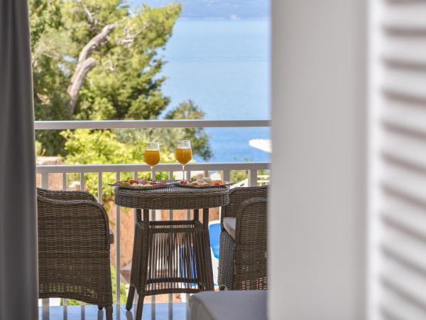 Hotel Osejava : photo 4 de la chambre chambre double ou lits jumeaux - vue partielle sur mer