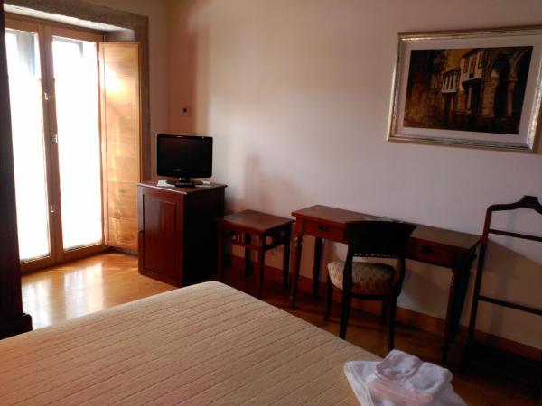 PR San Nicolás : photo 2 de la chambre chambre double ou lits jumeaux