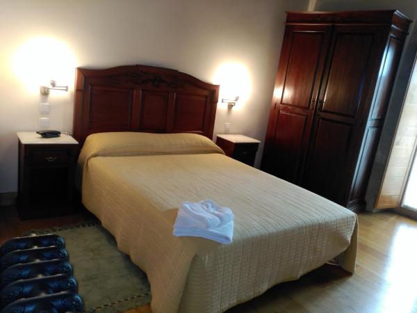 PR San Nicolás : photo 1 de la chambre chambre double ou lits jumeaux