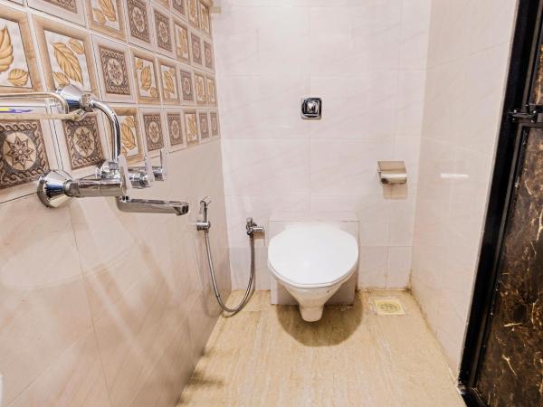 FabExpress Embassy Grand : photo 1 de la chambre chambre deluxe