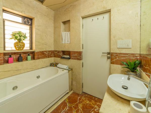 Coliwo Deux - Chandan Nagar : photo 4 de la chambre chambre lit king-size deluxe