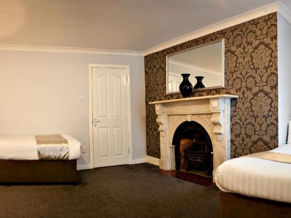 Clifden House by Nina : photo 2 de la chambre chambre triple